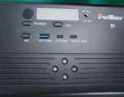 How to understand "IN/OUT 60W" and "DC Out 12V 6A" on the Purmars panel?