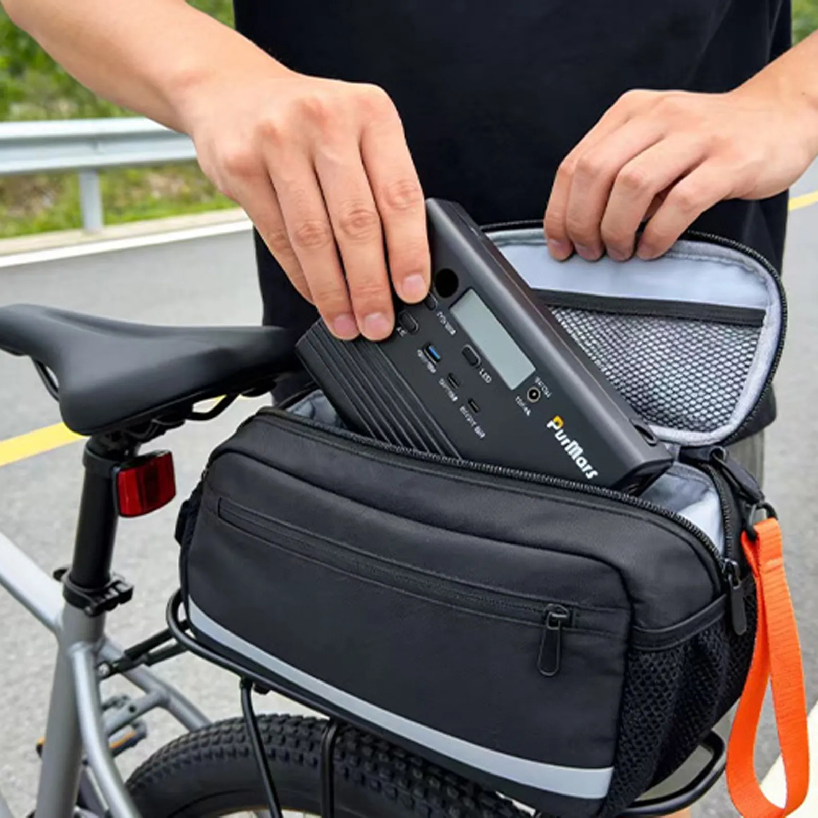PURMAES P100A/E Portable Outdoor Power Station, 92Wh, equipped with three output options: AC output, USB, and DC output.